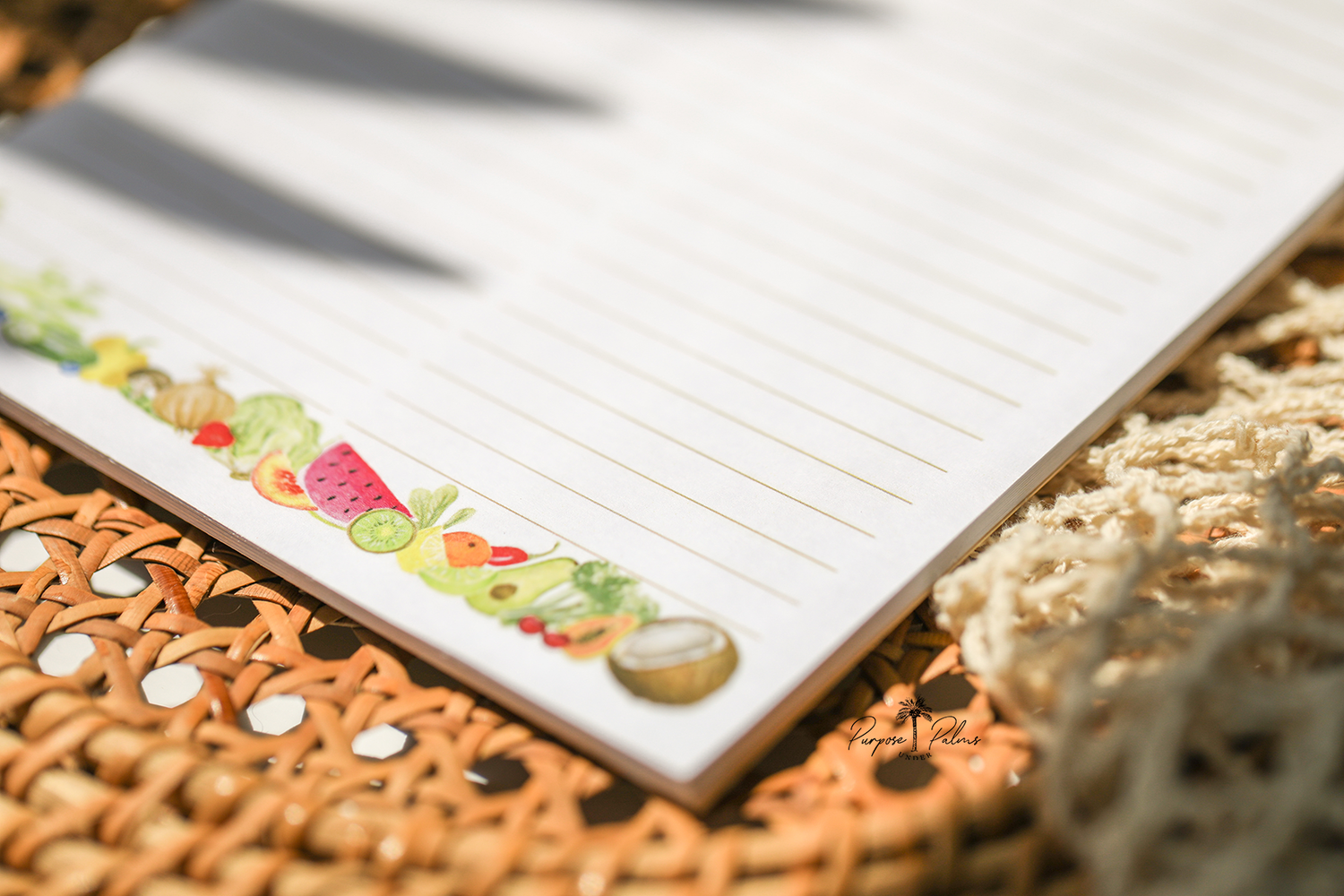 white grocery list notepad with grocery list at the top and two lined columns. watercolor fruits and vegetables at the bottom.
